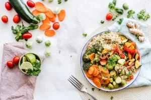 A plate of salad with vegetables